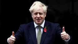 Britain's Prime Minister Boris Johnson meets fundraisers for the Royal British Legion outside Downing Street in London